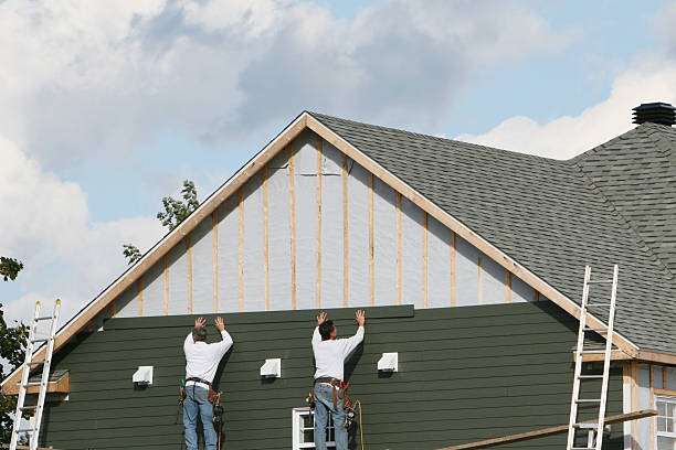 Professional Storm Damage Siding Repair technician working in Beavertown, PA